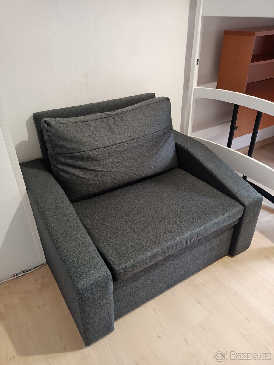 Šedé rozkládací křeslo