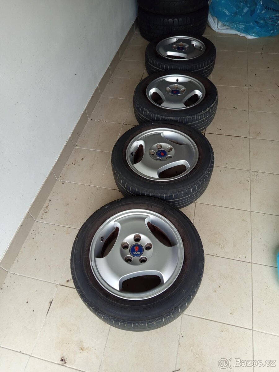 4 originální R15 Alu disky s pneu na Saab 900, Saab 9-3