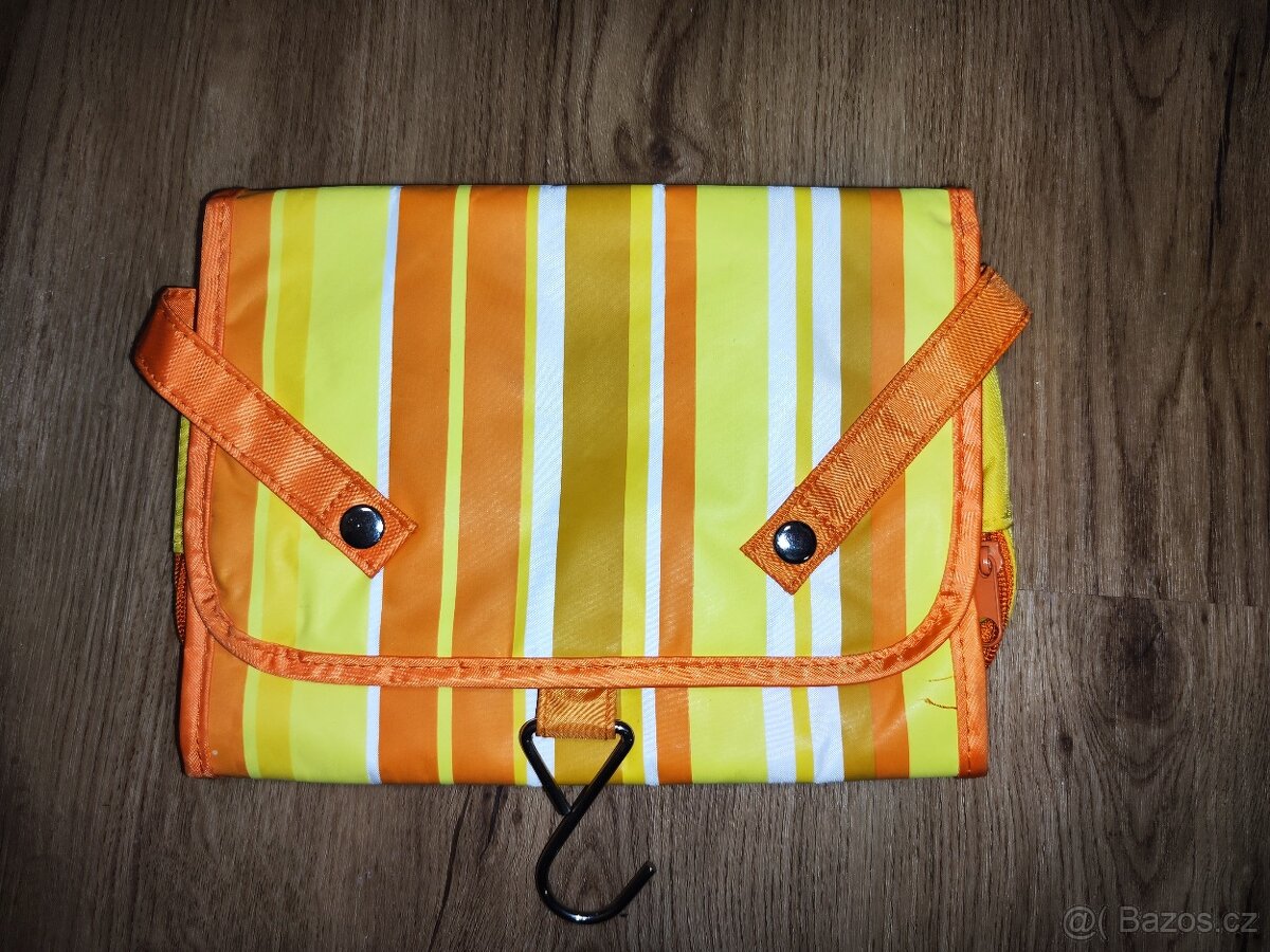 Závěsná kosmetická taštička Avon