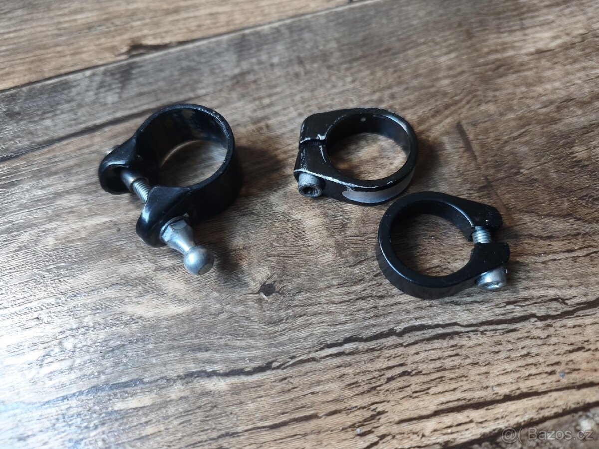 Objímka sedlovky, zámky gripů