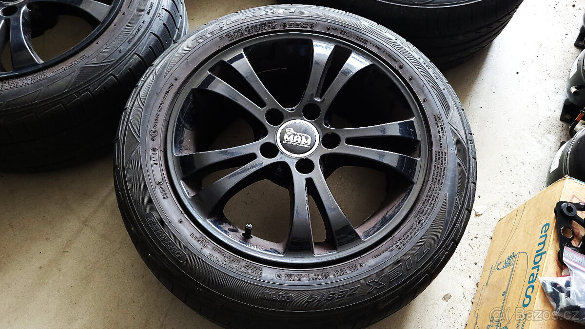 Černá letní ALU kola 16" 5x112 Passat B6/B7