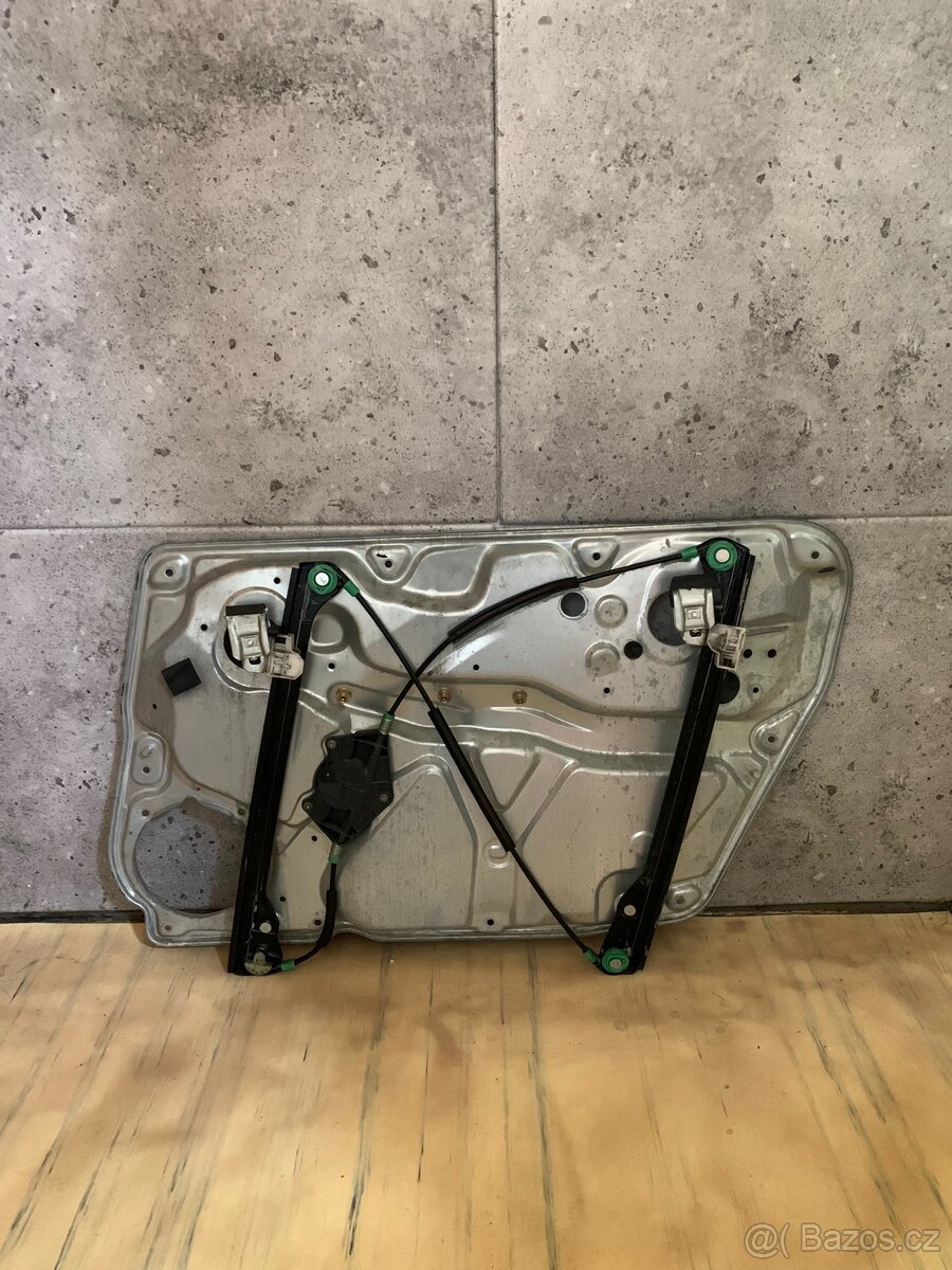 Levá přední stahovačka včetně elektromotoru VW Passat B5,5