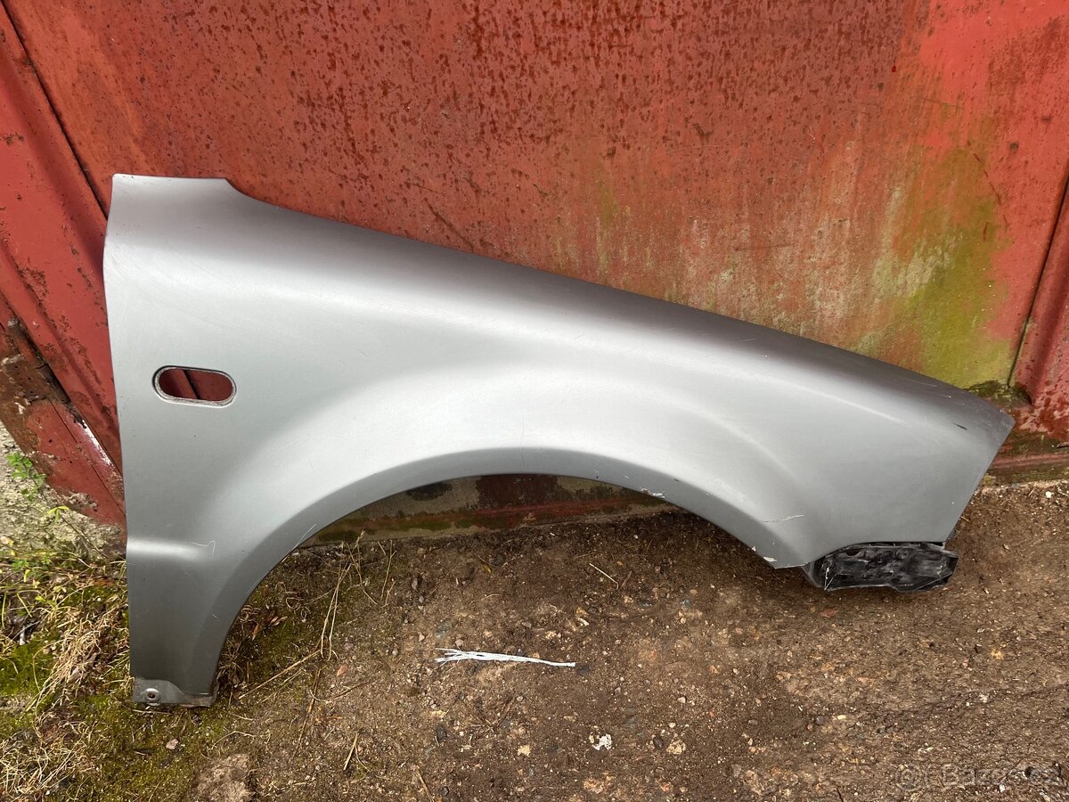 Pravý přední blatník VW Passat B5,5