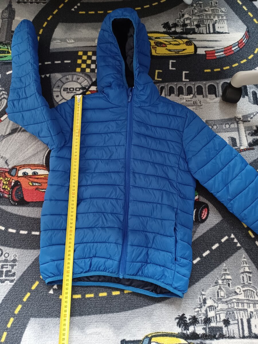 Modrá dětská zimní bunda 146/152