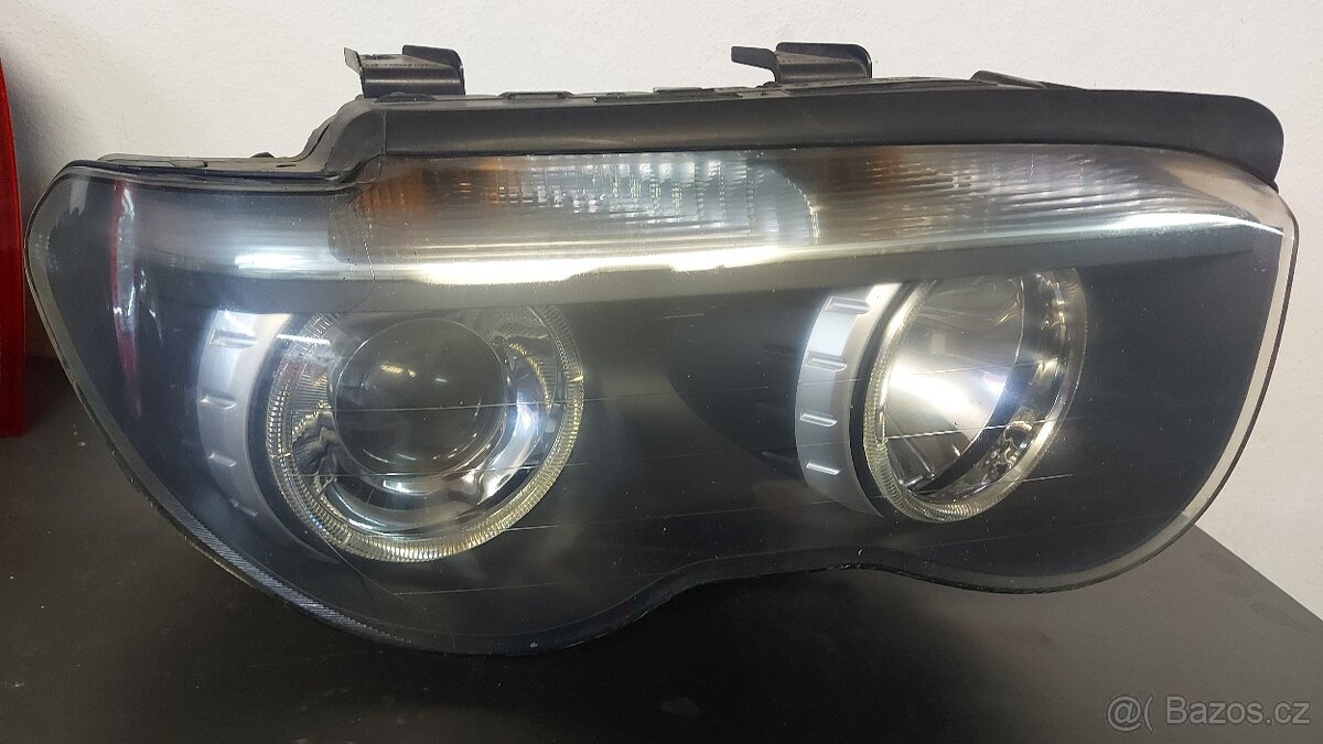 Predni xenony bmw 7 e 65