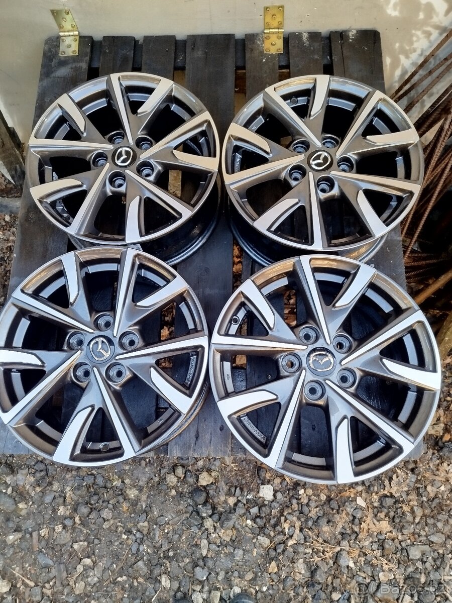 ALU originál Mazda 5x114,3 R16 6,5J ET 50 střed 67mm