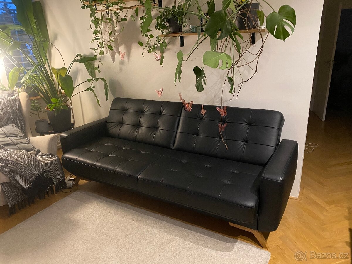 Elegantní nová kožená černá sedačka