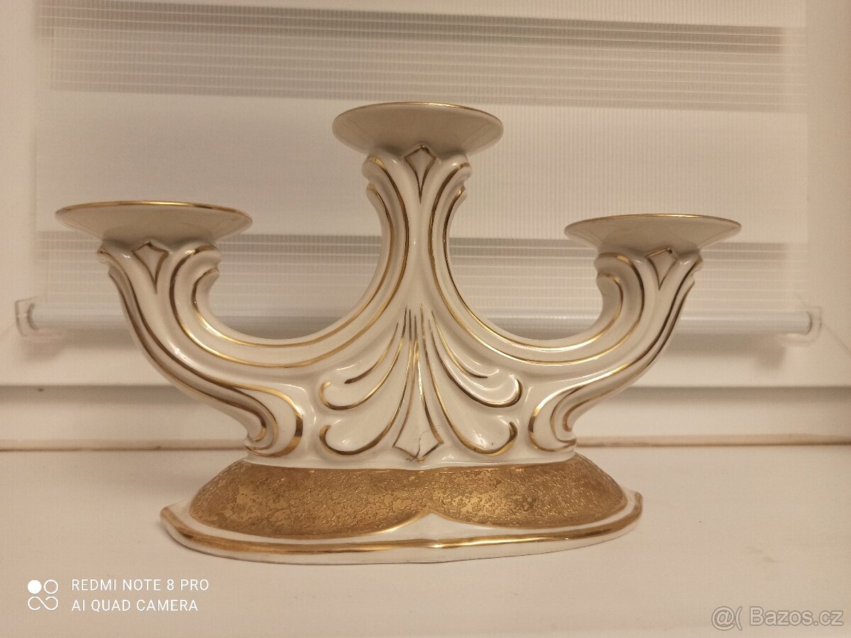 Starožitný porcelánový svícen