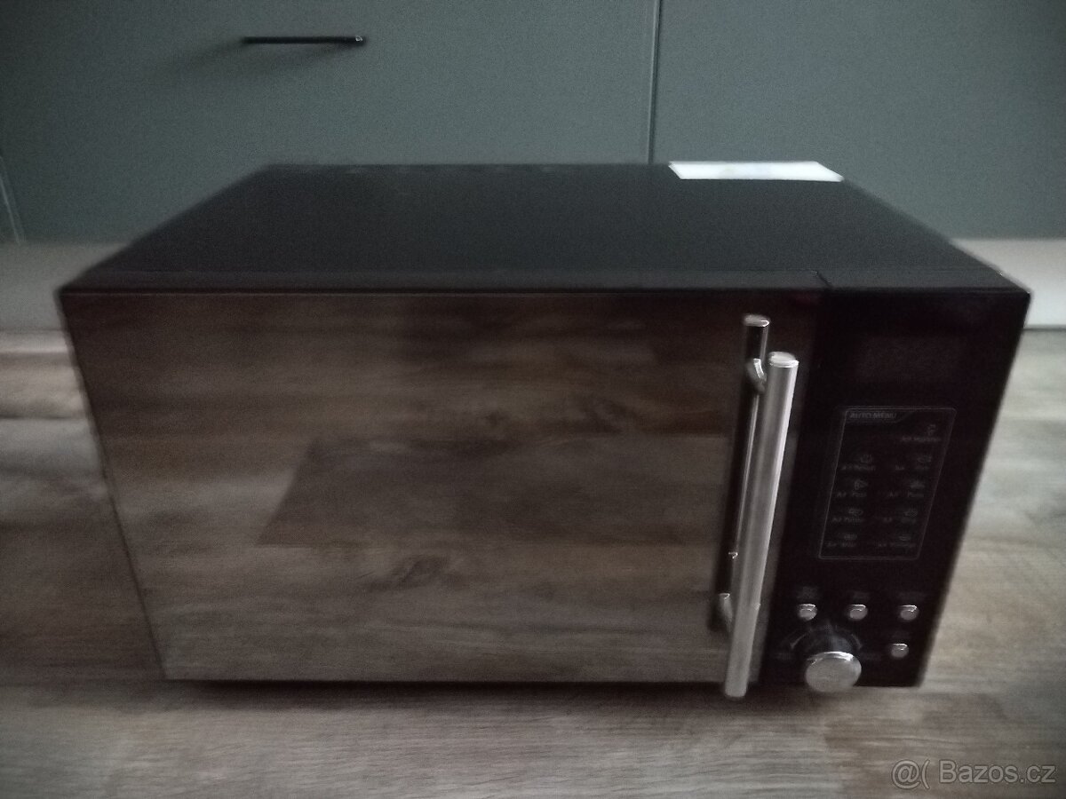 Mikrovlnná trouba Tricity s grilem, černá