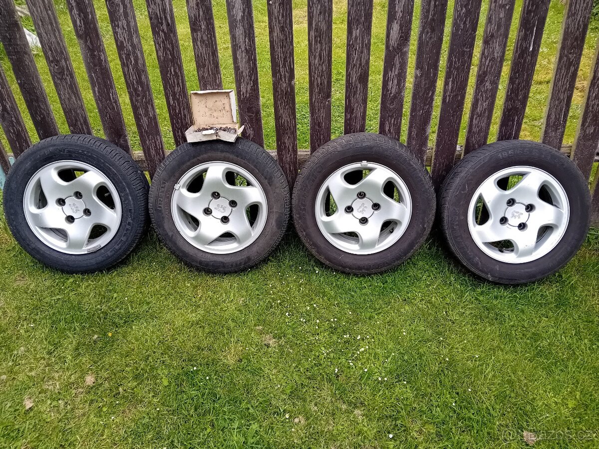 Prodám alu kola peugeot 14