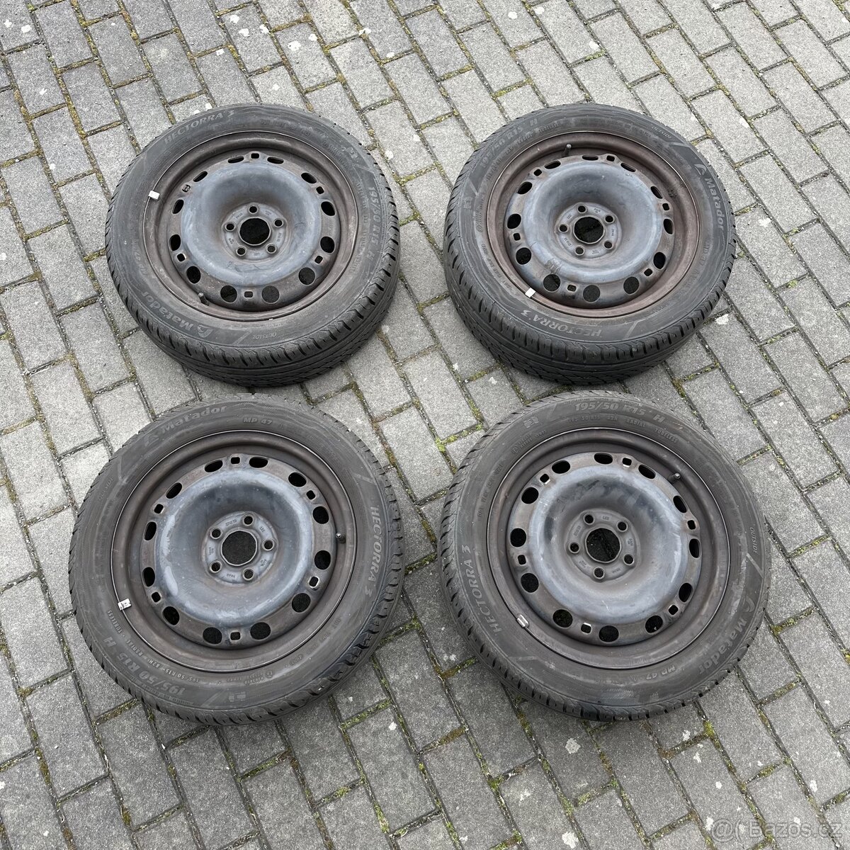 Plechové disky 5x100 s pneu 195/50 R15 (Fabia)