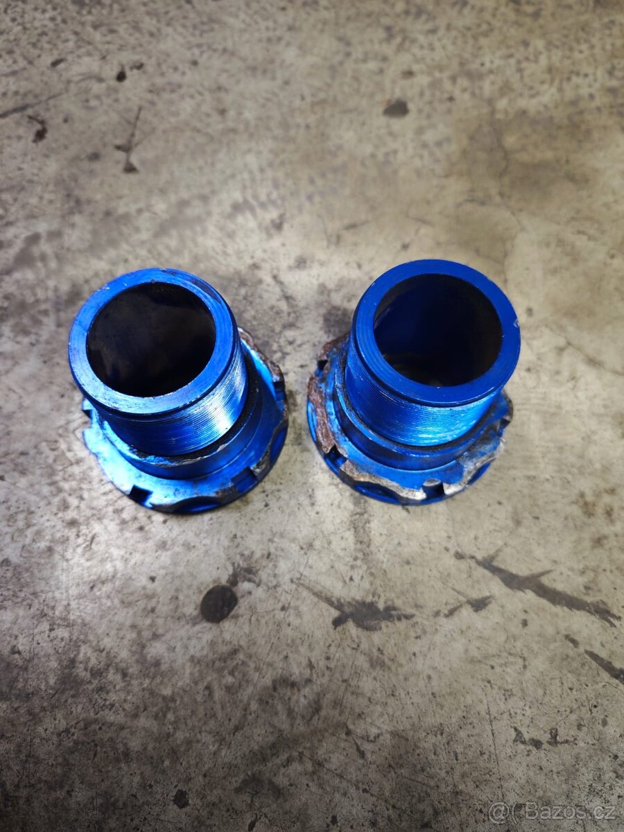 Stavitelné podložky ( matice ) pod zadní pružiny BMW