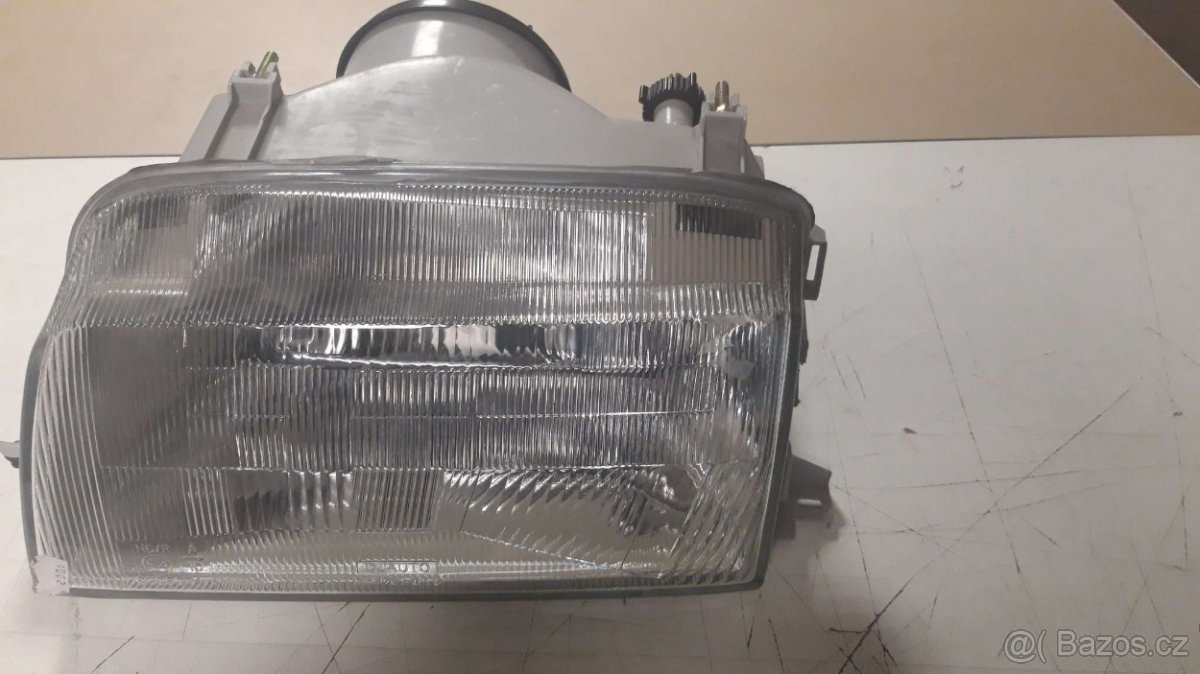 Světlomet levý Renault 19 Nový