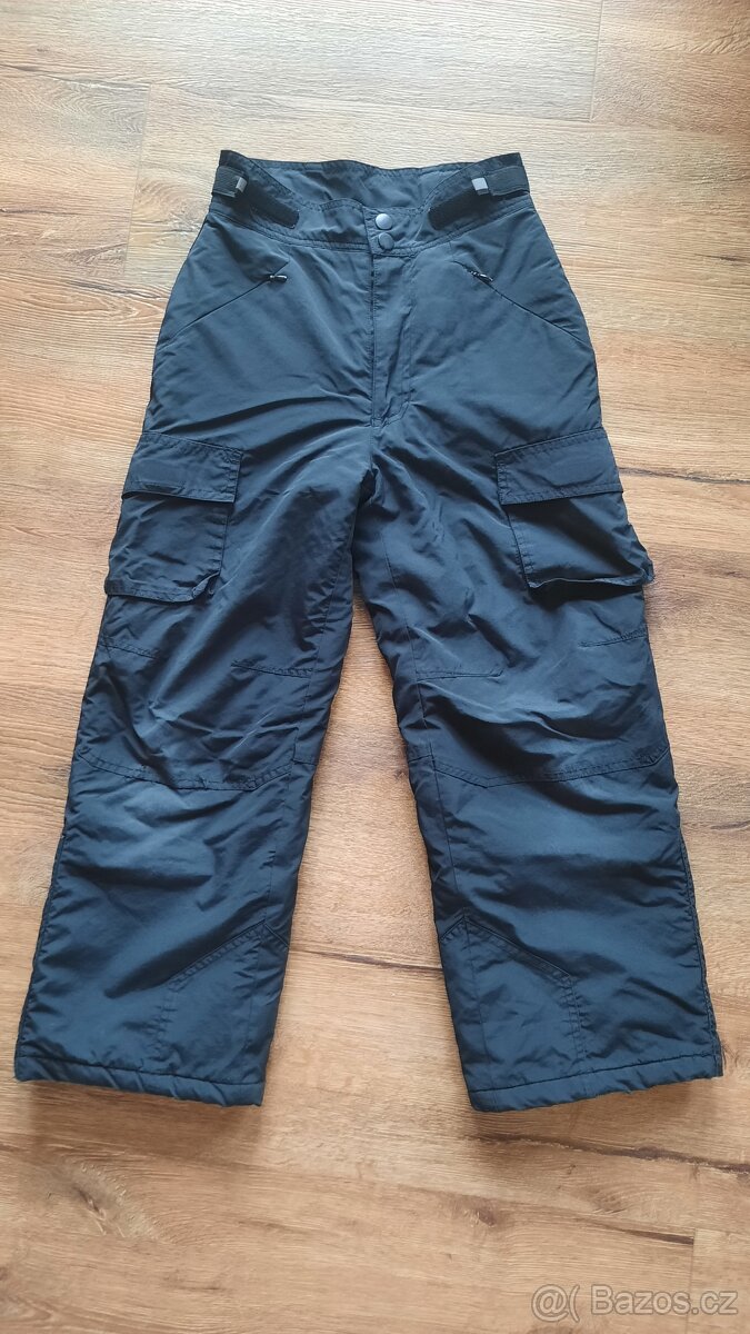 Vyleteplené kalhoty Okay vel.128.
