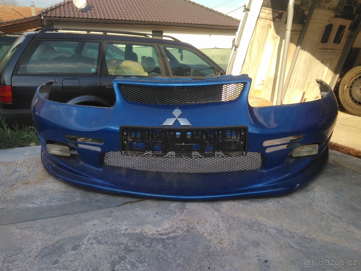 Tuningový laminátový nárazník Mitsubishi Carisma 1995-1999
