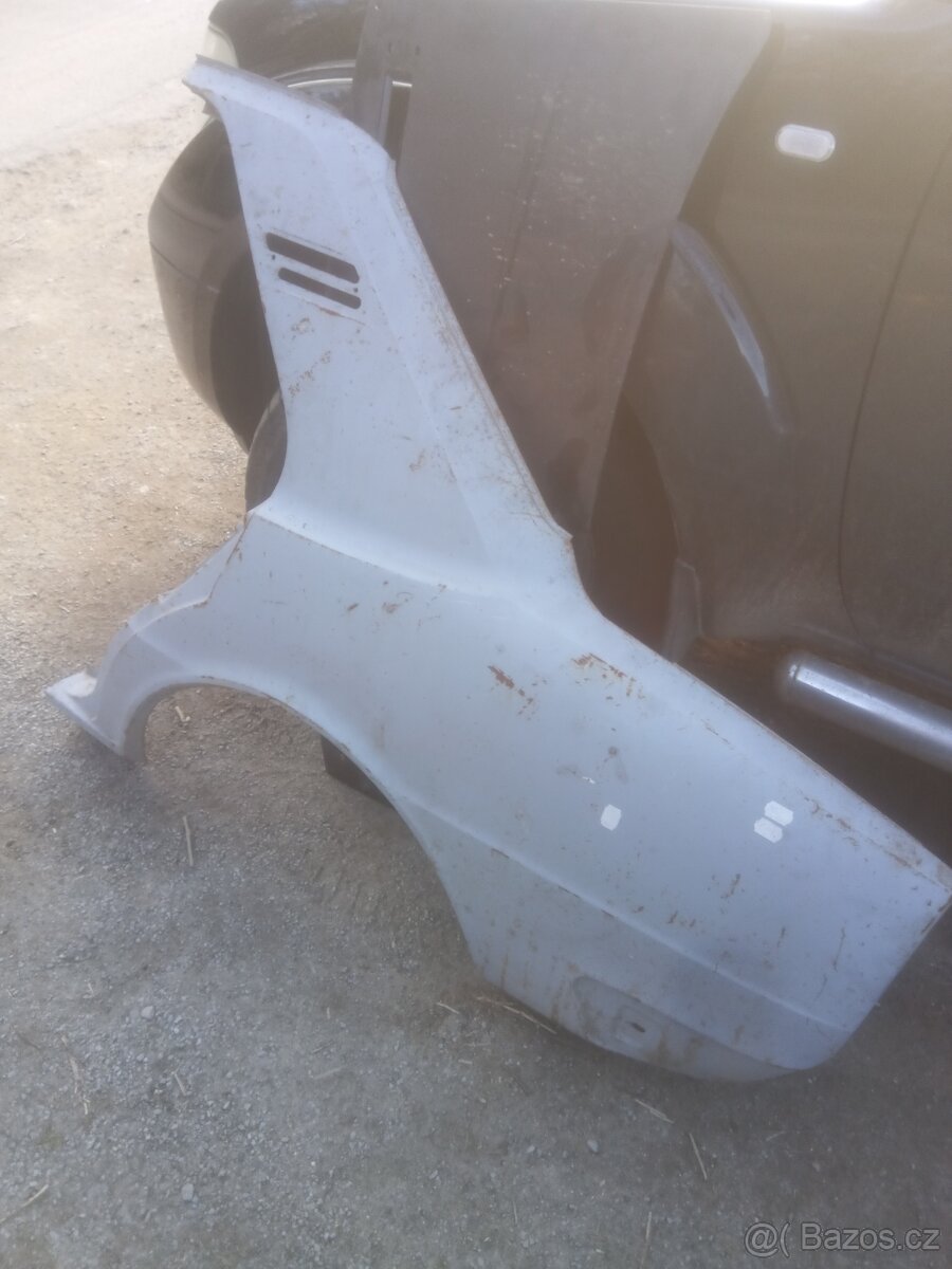 Škoda 105/120 zadní blatník nový