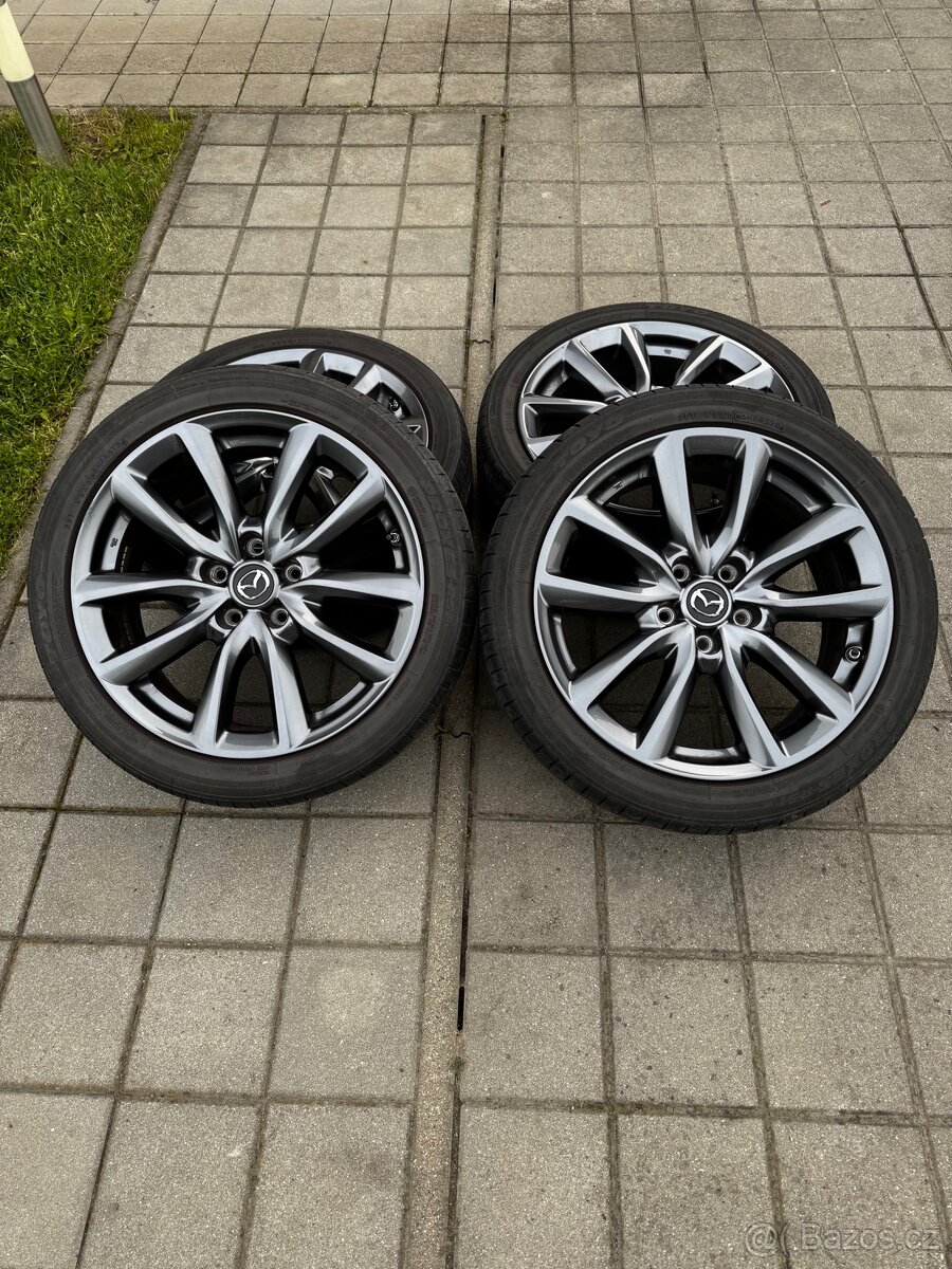 Alu kola original Mazda R18