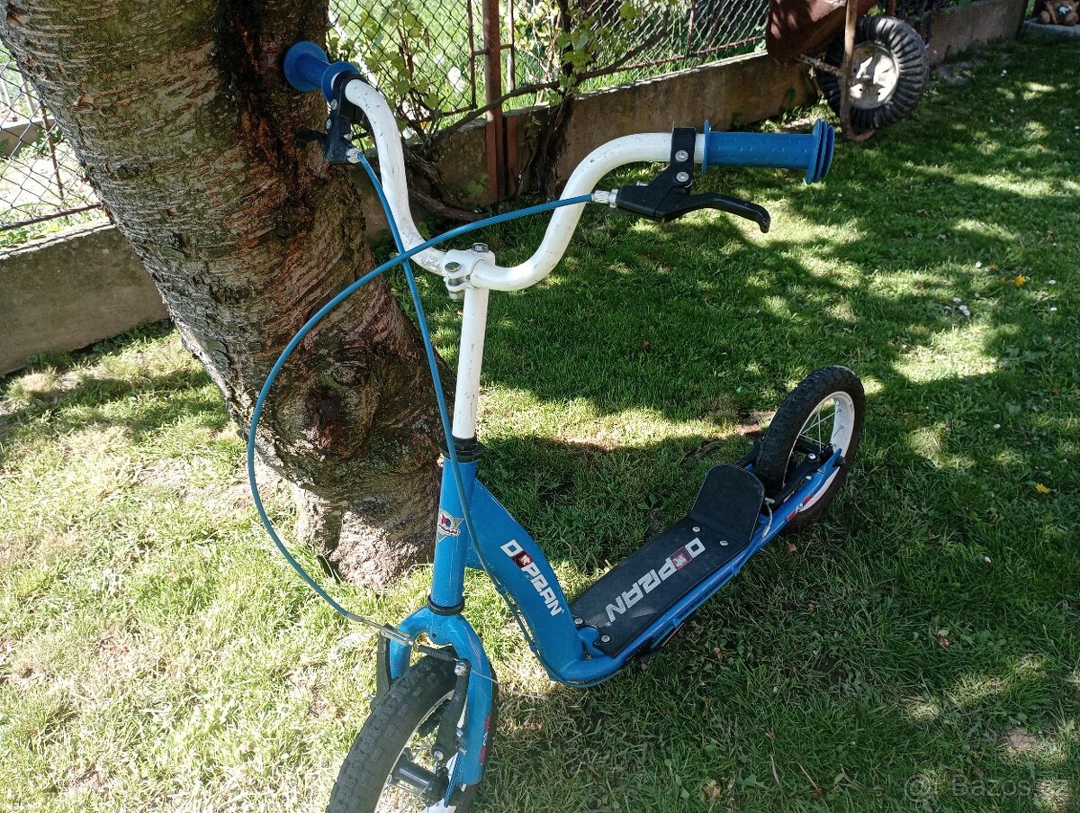 Dětská koloběžka .