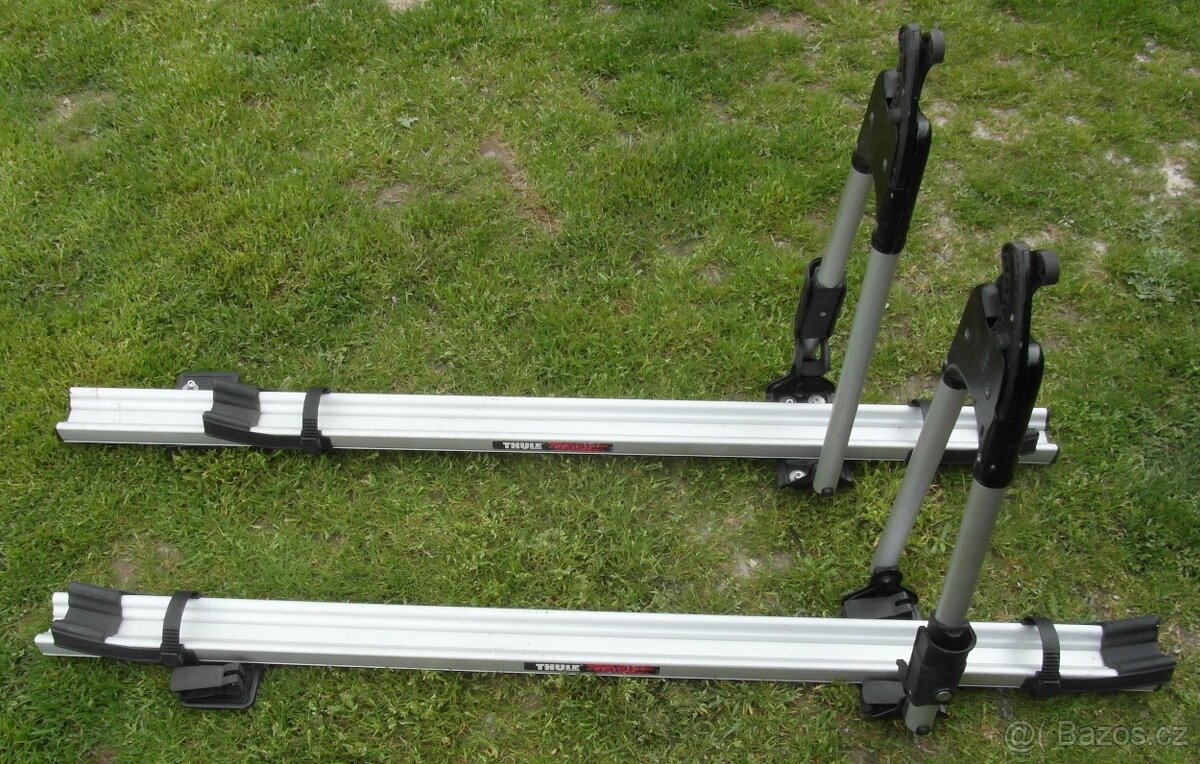 Dva střešní nosiče kol THULE + zahrádka = úklidová cena