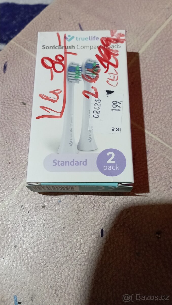 Jedna nová, náhradní hlavice na sonický kartáček