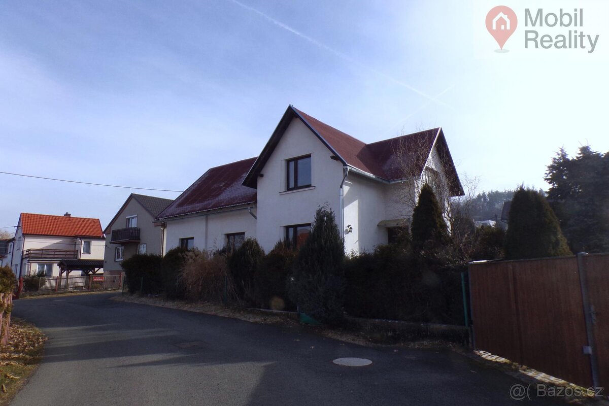 Dvoupodlažní rodinný dům s pozemkem po částačné rekonstrukci