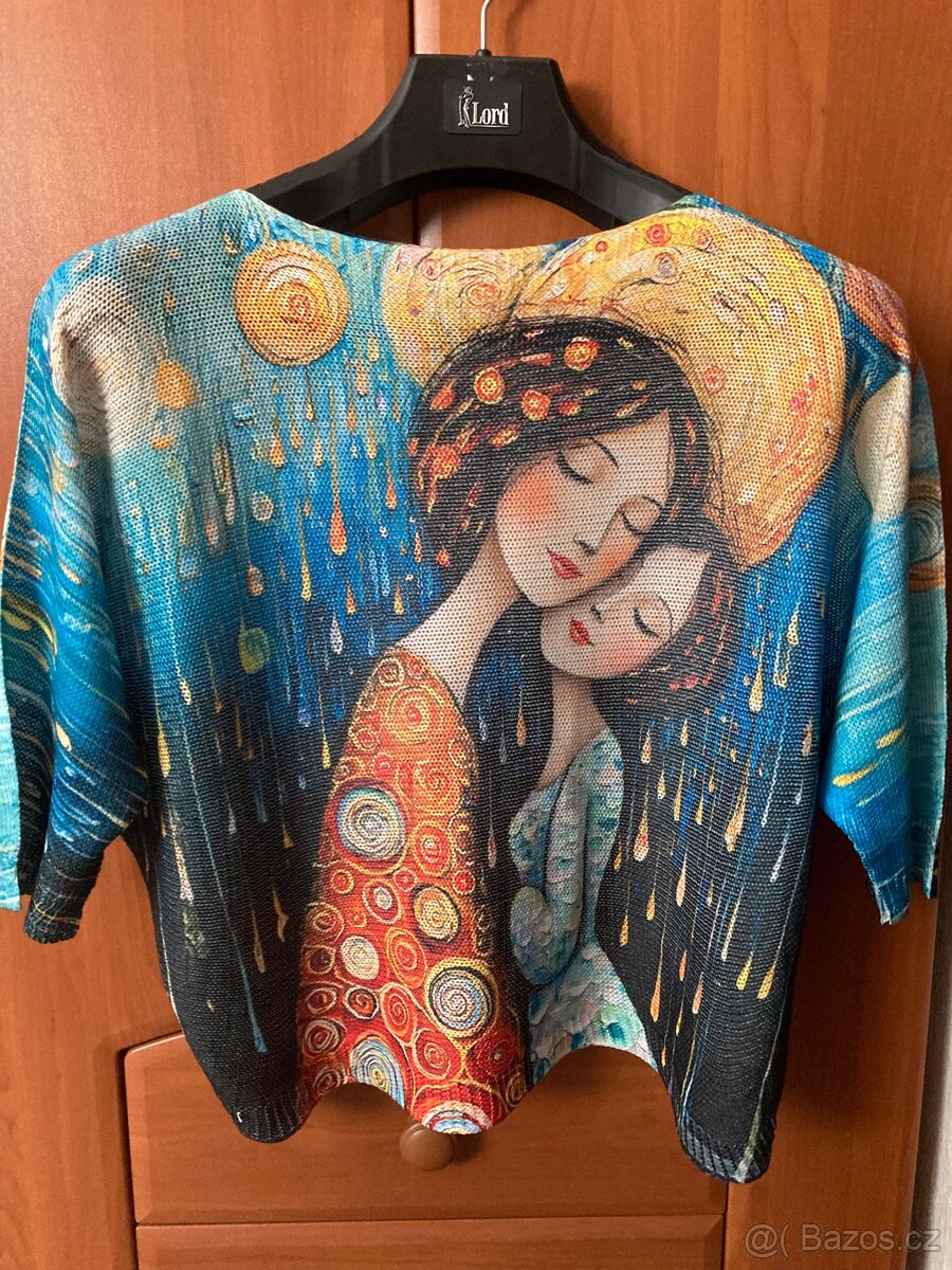 Dámský krásný svetr