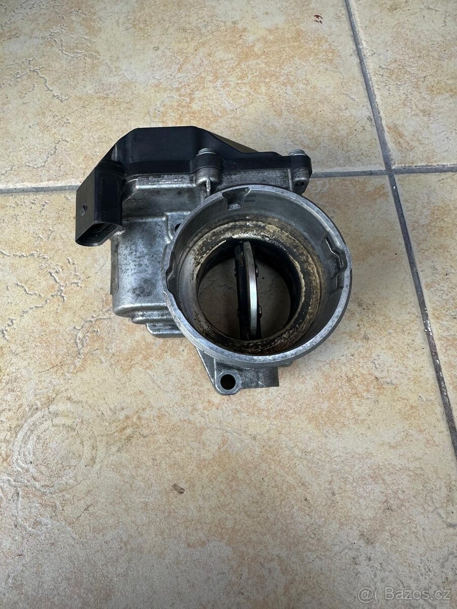 VW Škoda Seat Audi škrtící klapka.