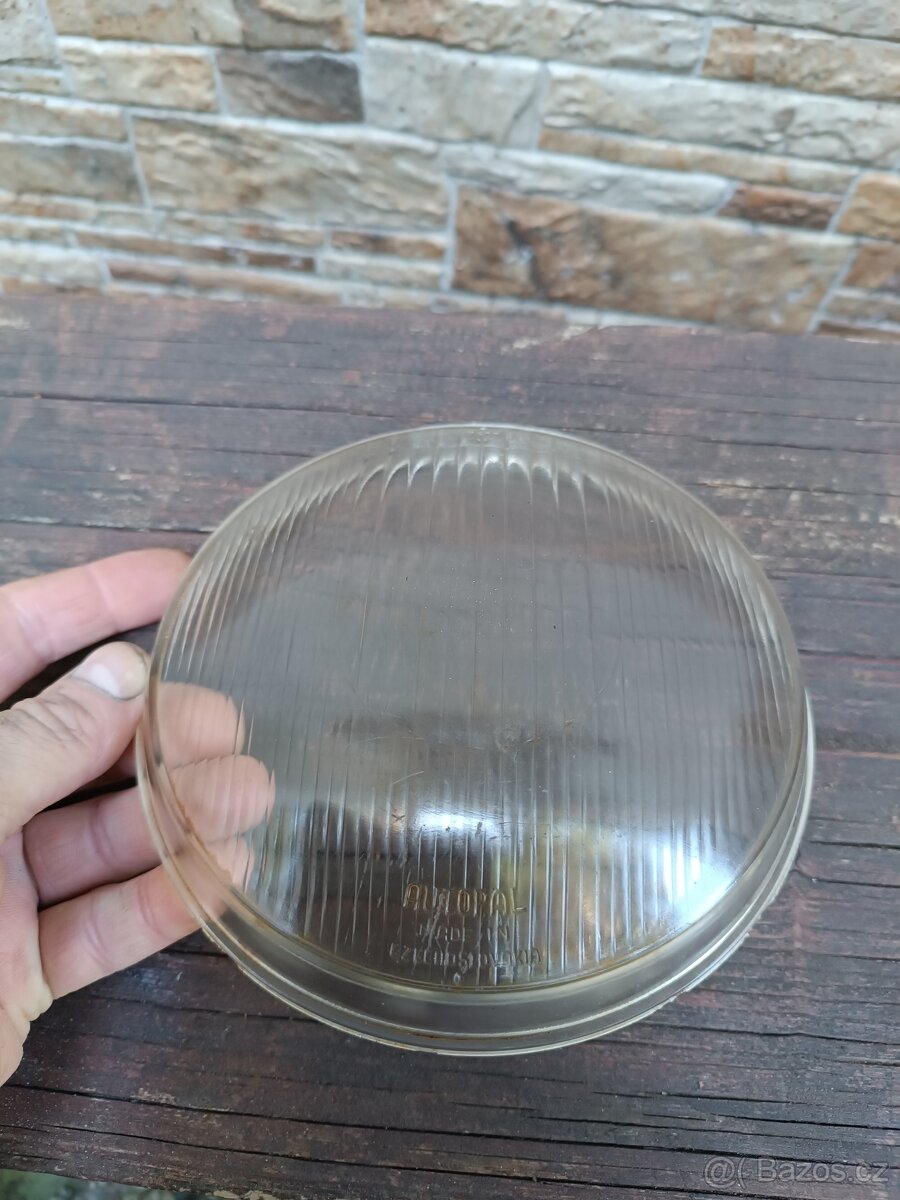 Sklo reflektoru předního světla na Jawu Kývačku/ panelku