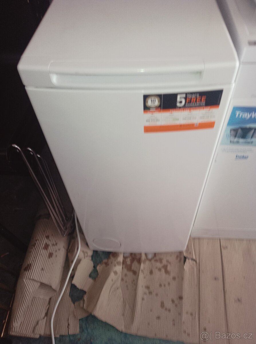 Pračka Whirlpool s horním plněním