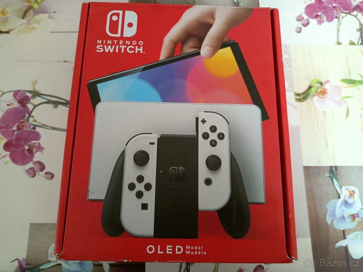 Nintendo Switch OLED + RING FIT ADVENTURE