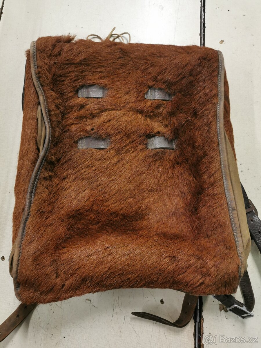 Vojenský batoh, Tele.