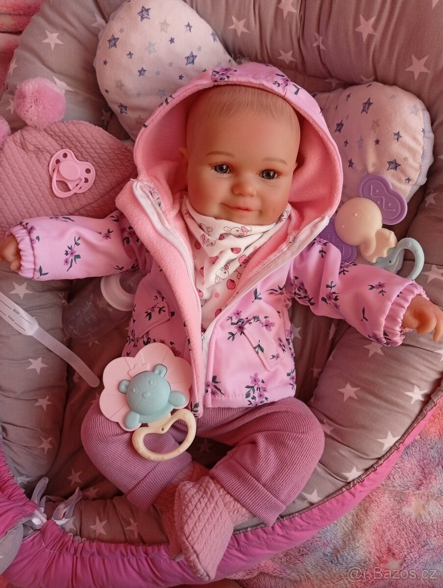 Realistická Reborn panenka usměvavá holčička Maddie
