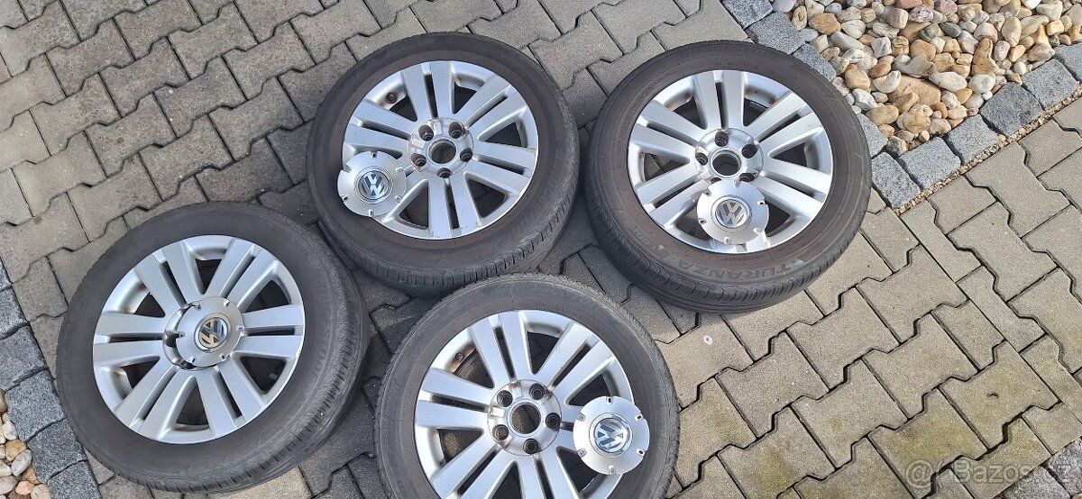 16" al disky 7x16 ET45 VW Passat,Škoda Yeti+pneu 205 55 16