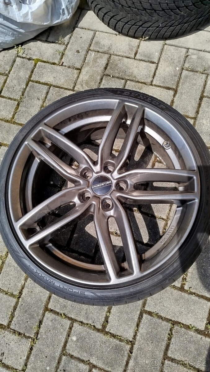 Hliníkové disky Musketier+ pneu Dunlop