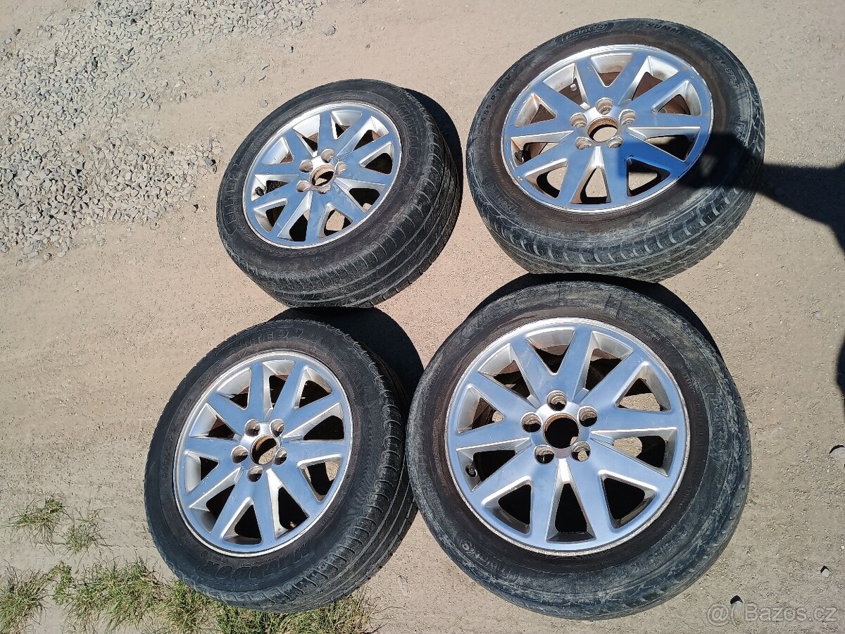 Pneu špatnéOrigFord 5X108 16 elektrony litá kola pěkný stav