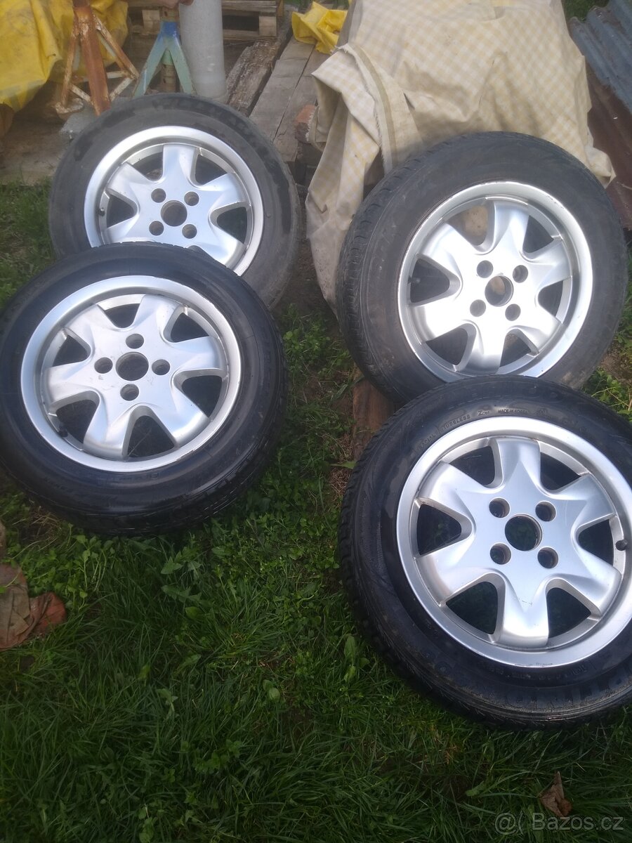 Sada originál Alu Disků FORD 15 + letní PNEU  