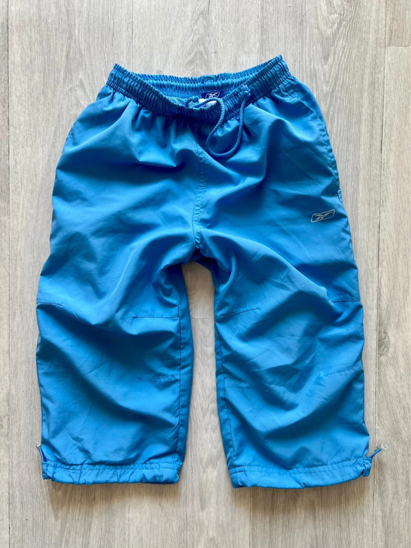 Kraťasy lehoučké Zn.Reebok vel.128/134