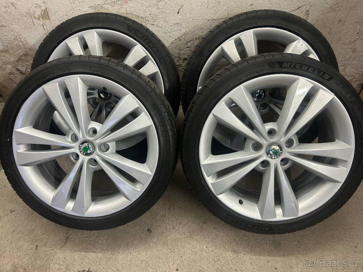 Originál alu kola Škoda Neptune R18 5x112 et51