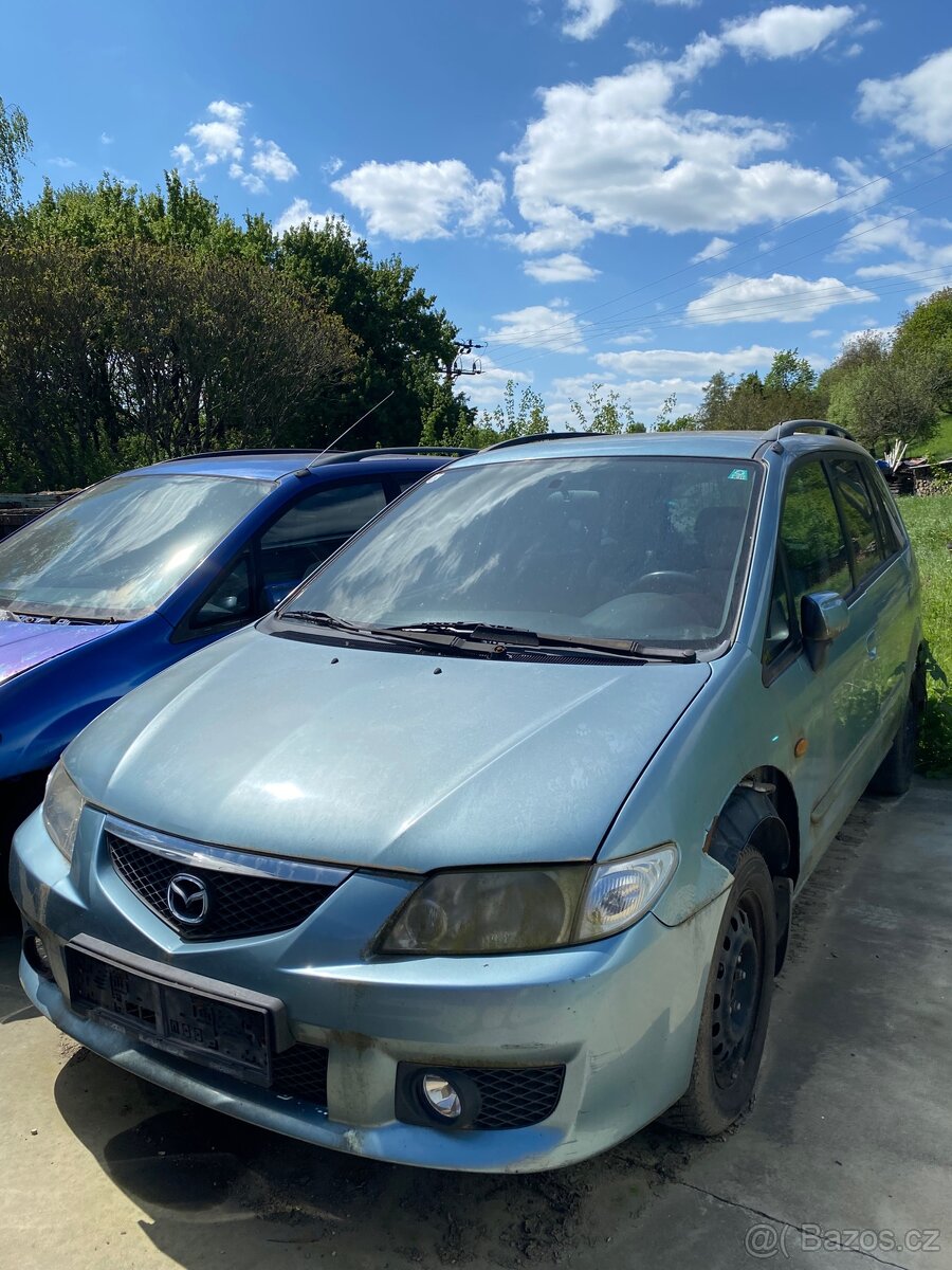 Mazda premacy na díly nebo opravu.