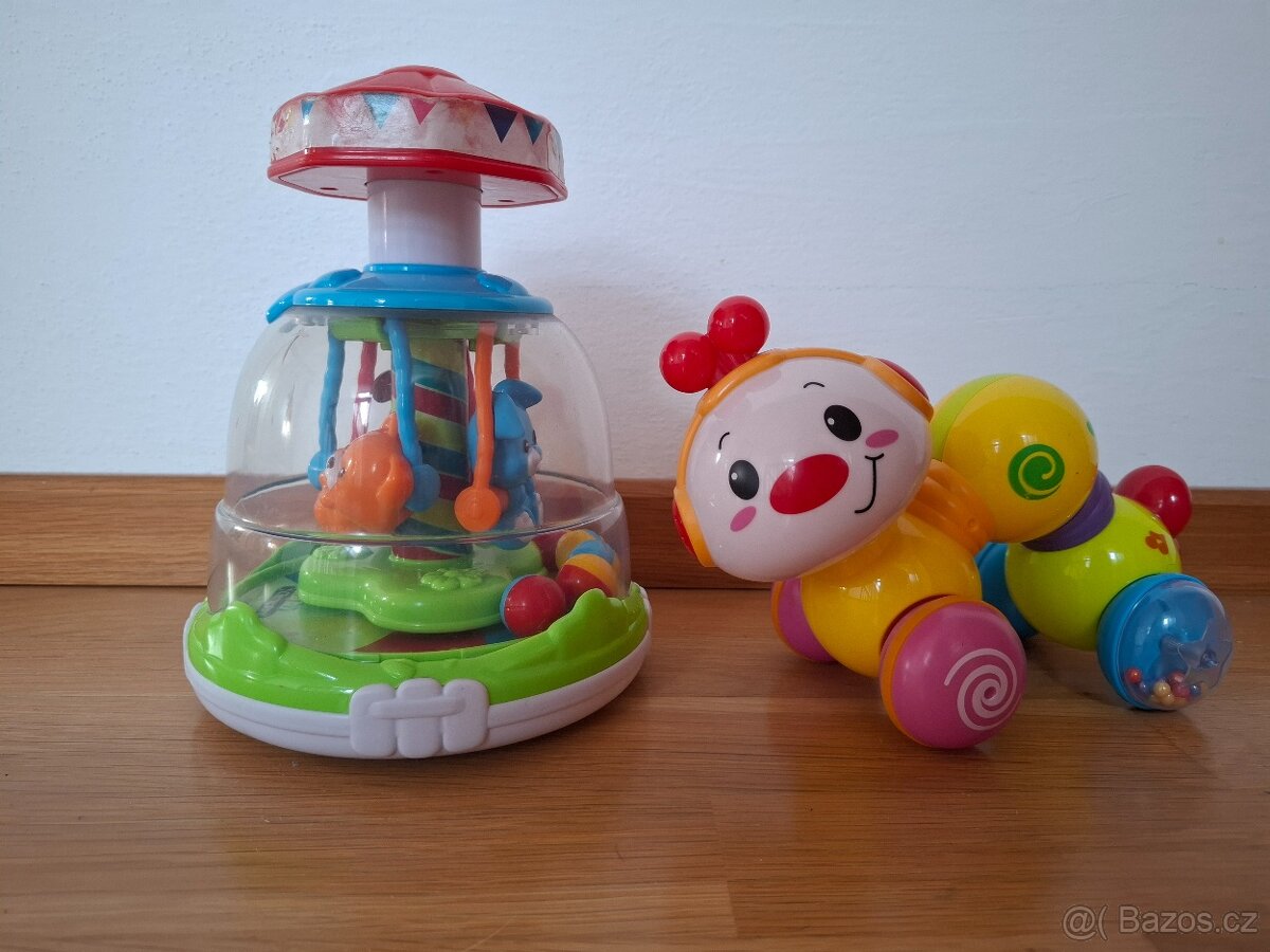 Prodám dětské hračky. Točící se kolotoč a jezdící housenka.