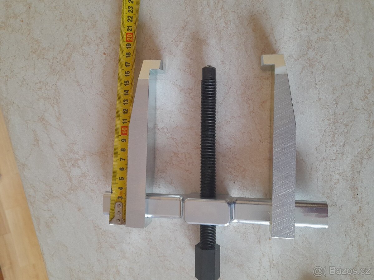 Dvouramenný stahovák