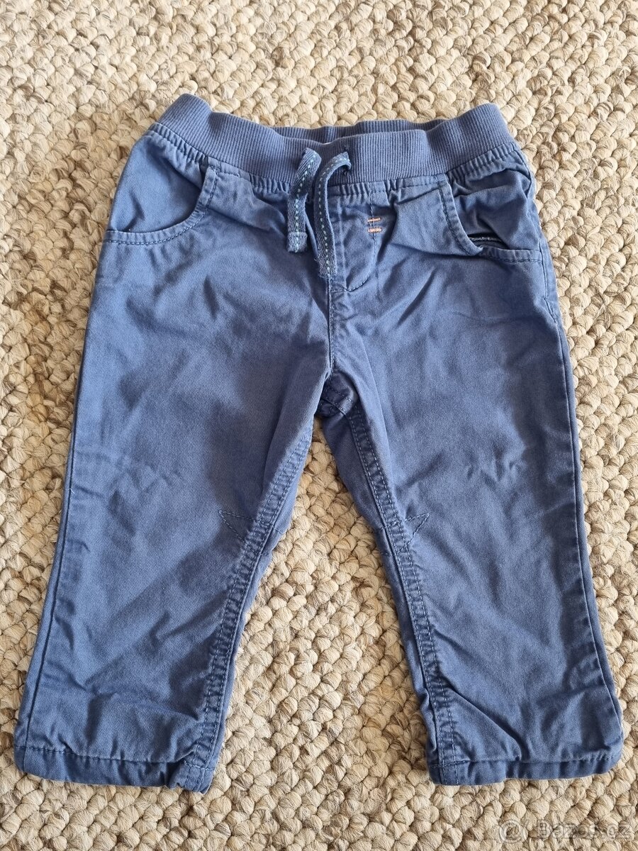Modré kalhoty zn. F&F 6-9 měs.