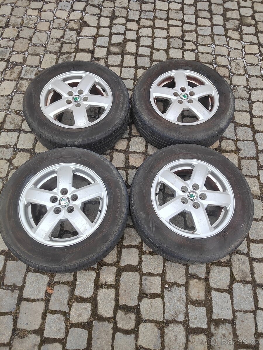 Prodám orig alu 15 škoda Octavia 1 5x100 ET 38 letní pneu