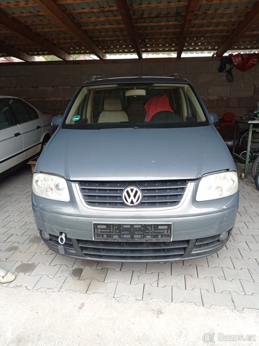 VW Touran 1,6 FSI ,85kw,r.2004
