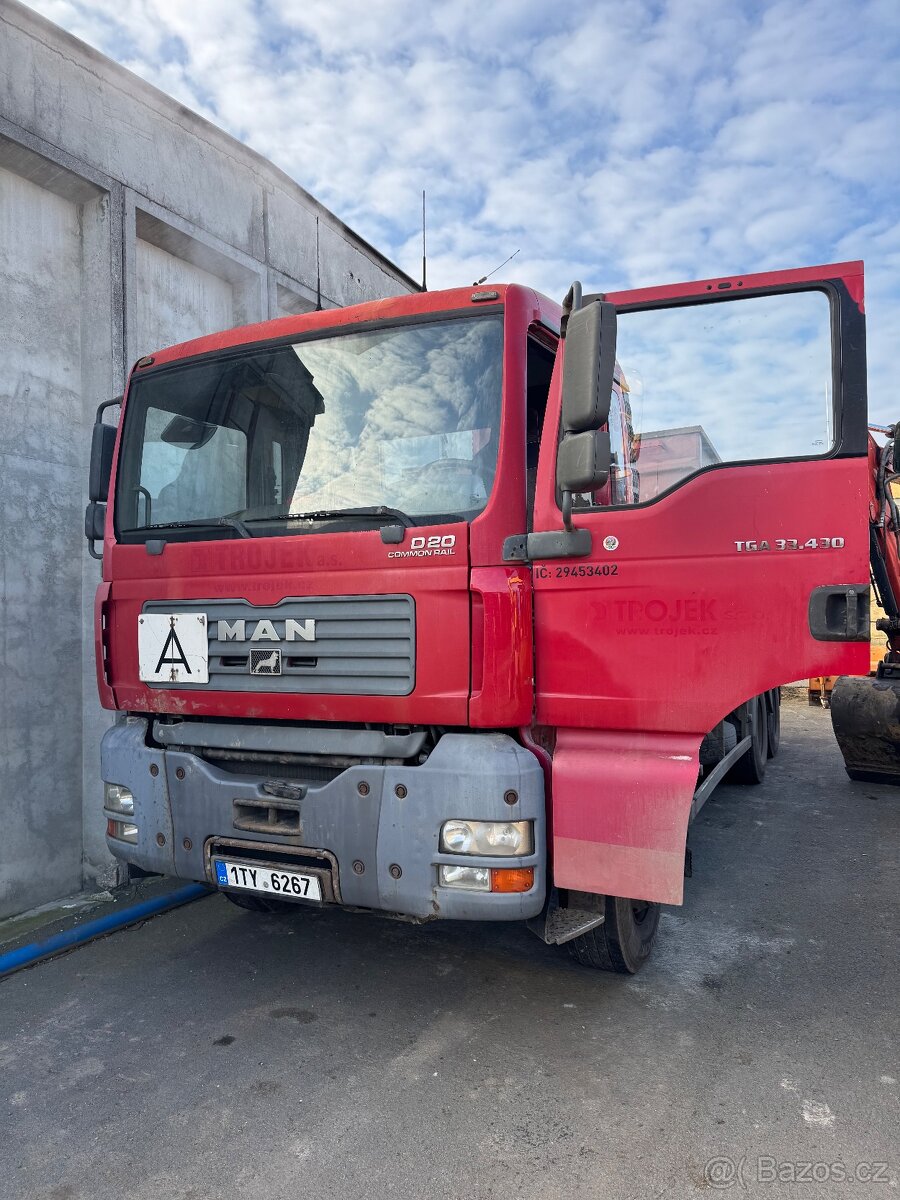 Man tga nosic kontejneru