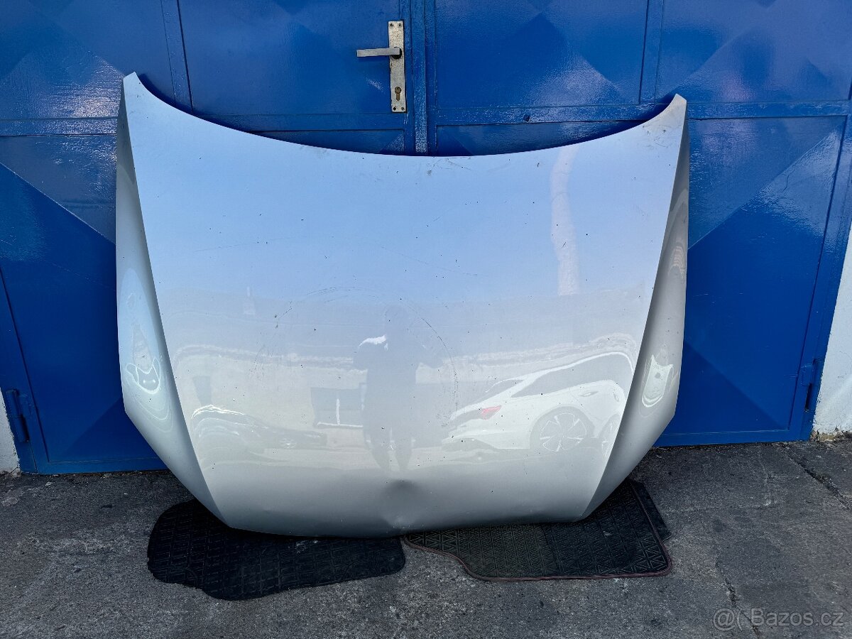 Poškozená originální kapota Volkswagen Passat B7 2011-2015