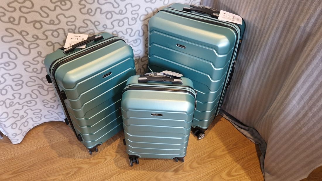 Nové cestovní kufry rozšiřitelné, různé barvy