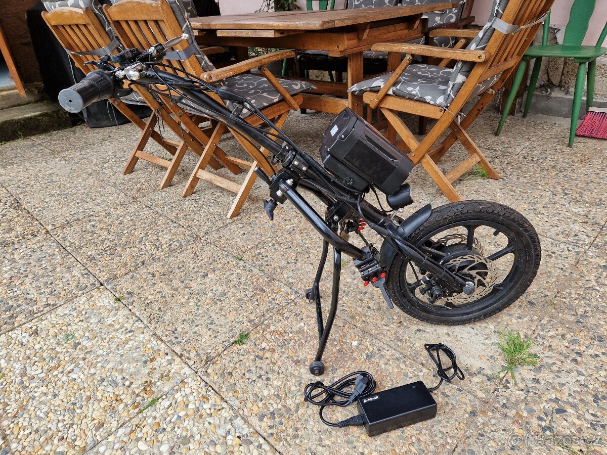 Přídavný pohon / motor k invalidnímu vozíku
