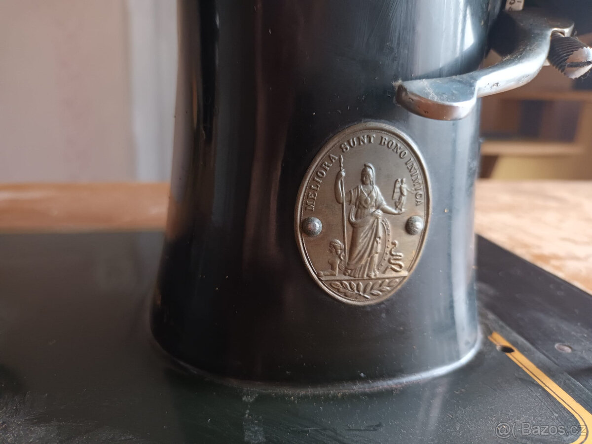 Šicí stroj Minerva za odvoz