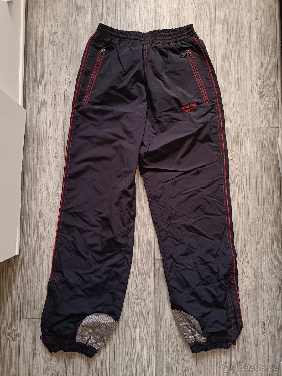 Šusťákové kalhoty vel. S/M